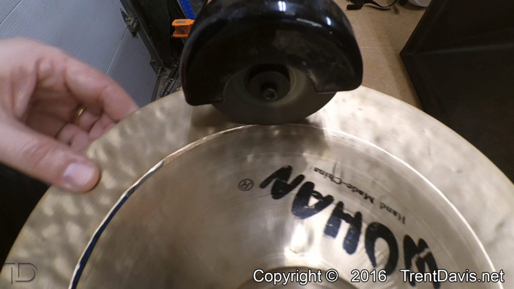 Fig. 3 - Getting close to finishing the cut on the first cymbal.