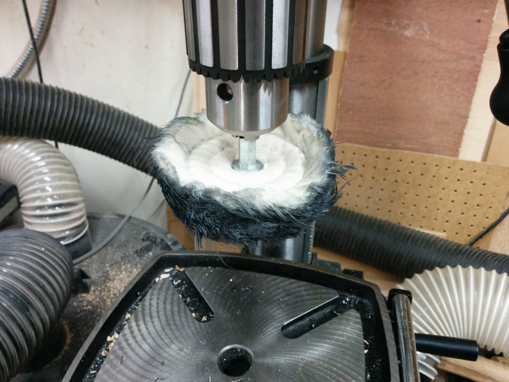 Buffing wheel on the drill press.