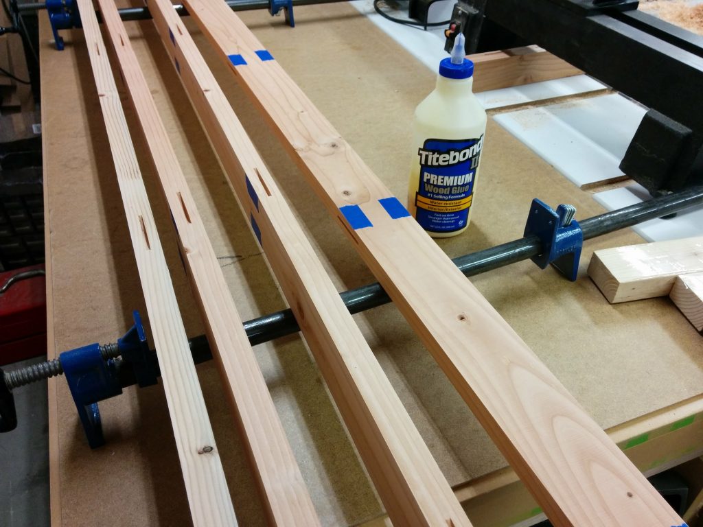 The boards are arranged so that the glue can be applied.