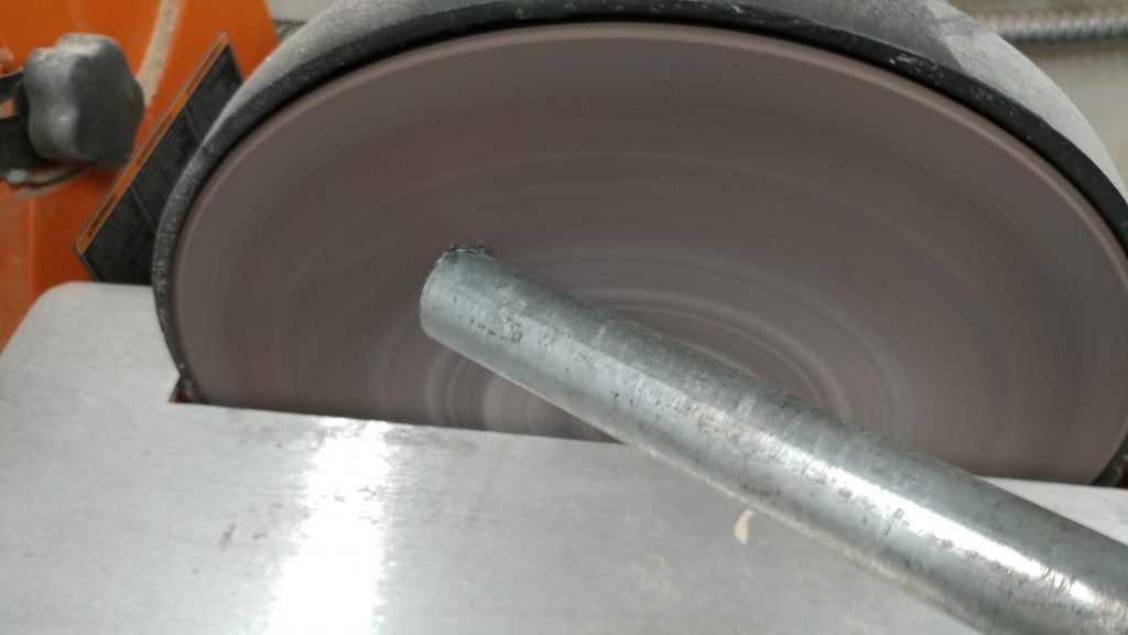 Adding a slight chamfer around the ends of each piece of pipe.